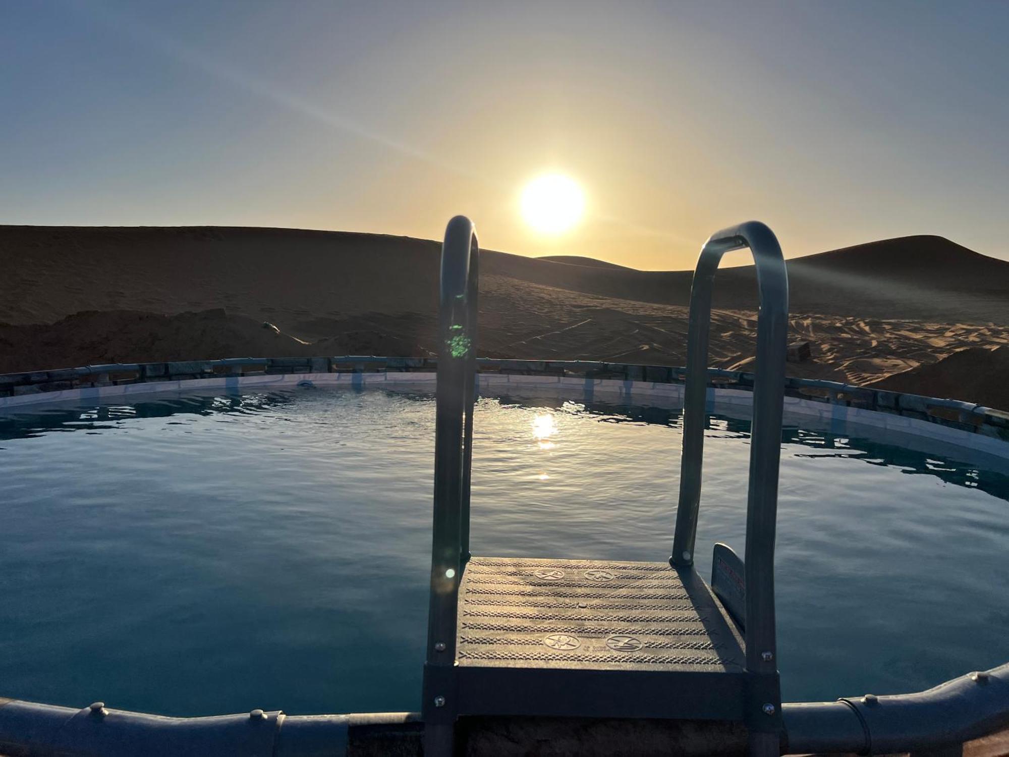 Sahara Majestic Luxury Camp Hotell Merzouga Exteriör bild Sunset at the Blue Lagoon